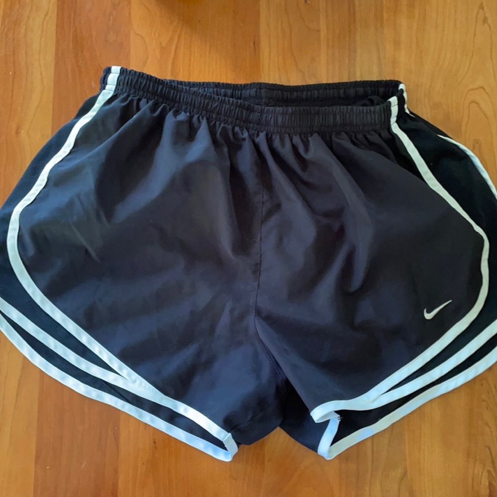 Black Nike running shorts